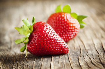 Fresh strawberry on wooden background