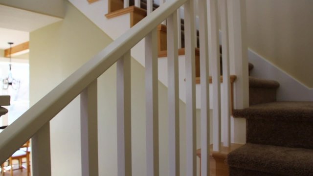 Dolly shot of stairs in a new home
