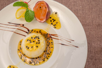 Cream pannacotta with passion fruit.