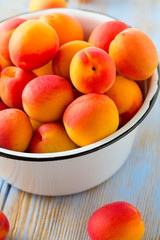 apricots on wooden surface