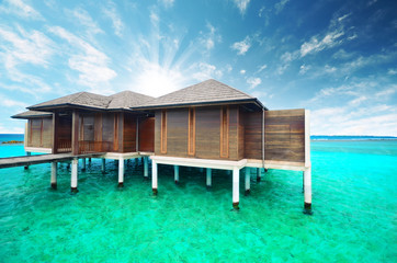 Water villas on tropical caribbean island, Maldives
