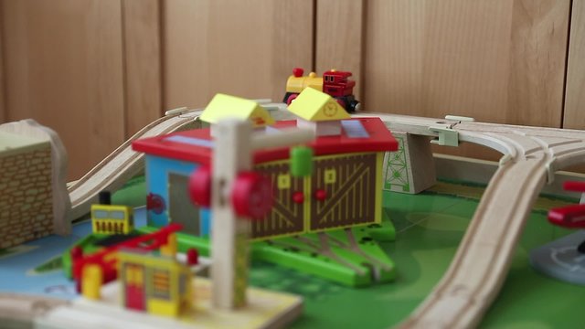 a motorized toy train on a track