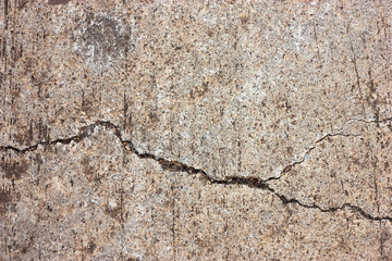 Cement floors are old and dirty.