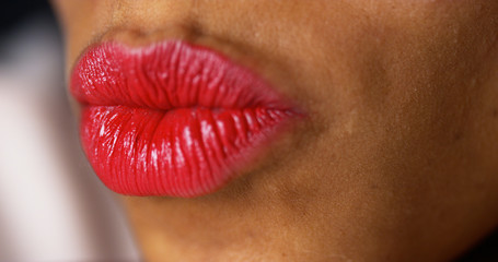 Closeup of woman puckering lips