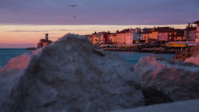 Piran old city at sea jib shot at sunset