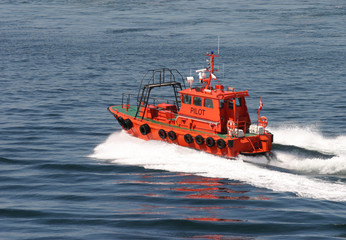 Orange pilot boat