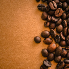 coffee beans on vintage color paper background
