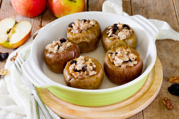 Delicious baked apple filled with minced meat, prunes, onions and walnuts