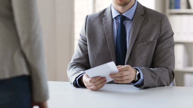 close up of businessman taking money bribe