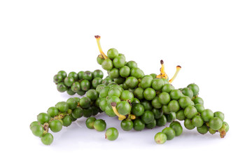 green color black pepper on white background