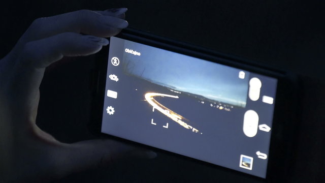 Mobile phone screen at night taking picture