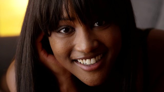 Sultry African woman looking at camera
