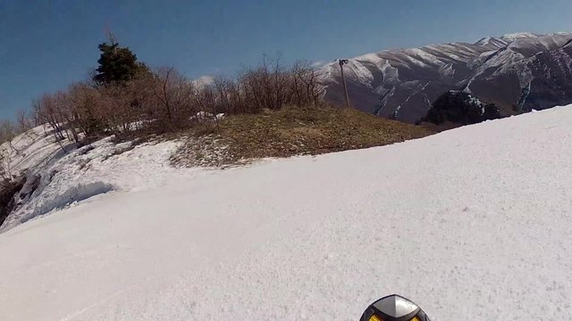 skis getting off lift for spring skiing