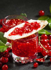 Red currant jam and bread, selective focus