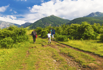 Family tourists in the mountain