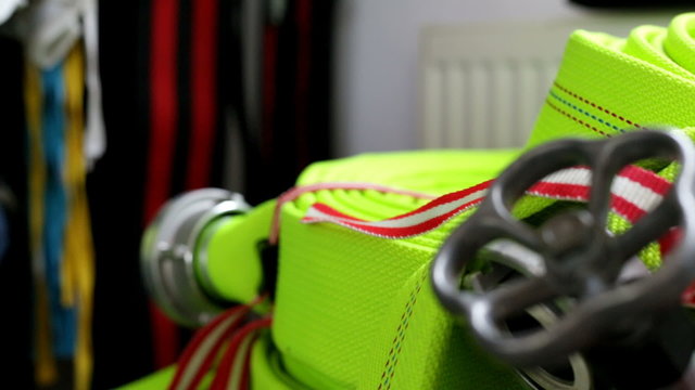 Fireman work clothes and fire hose