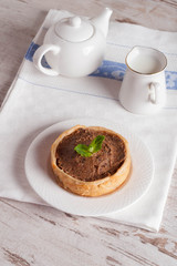 mini cake with chocolate cream and milk