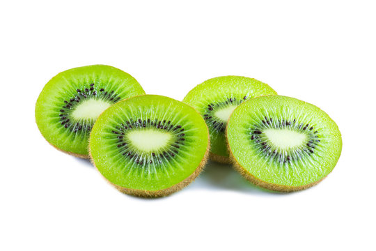 Kiwi fruit and split half isolated on white