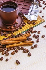 Bar of chocolate and a cup of coffee