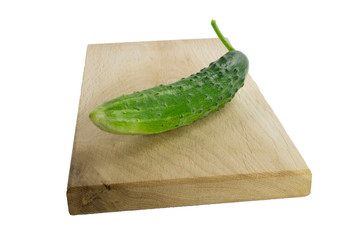 Sliced cucumber on cutting board close-up