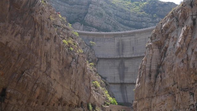 a dam by the hanging temple in datong china with tourists