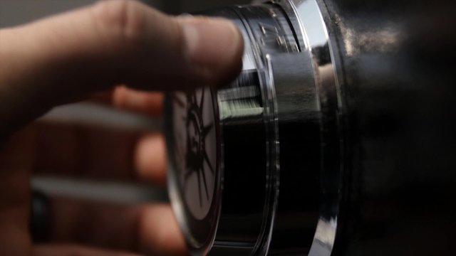 A man unlocking a safe
