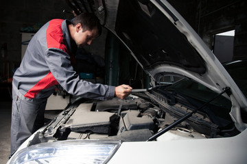 Obraz na płótnie Canvas Car mechanic. Auto repair service.