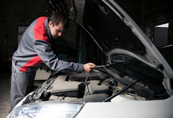 Fototapeta na wymiar Car mechanic. Auto repair service.