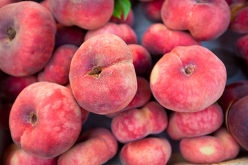 Fresh peaches selling in a market