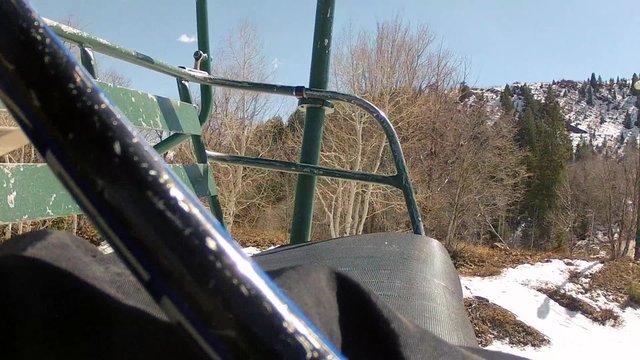 man on ski chair lift