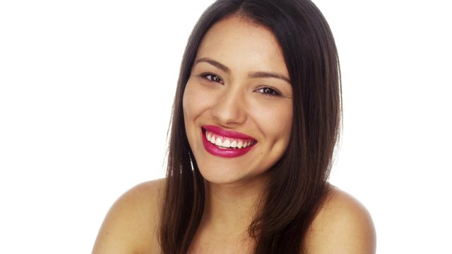 Cute Mexican woman smiling and looking at camera