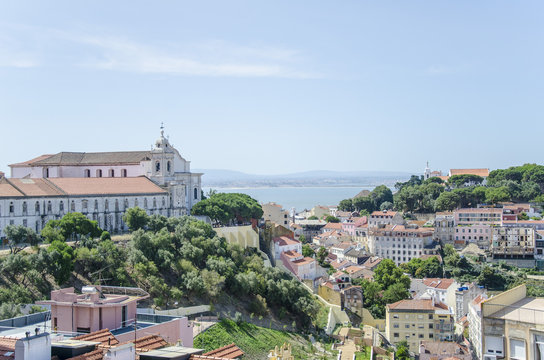 Lisbon rooftops view and church