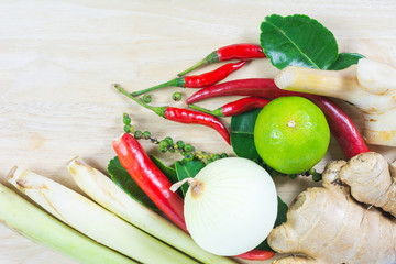 herb and spicy ingredients for making Thai food on wood backgrou