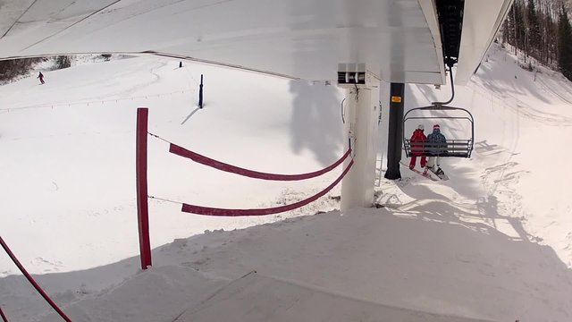 boarding a ski lift in park city