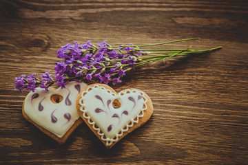 Pair of the cookies in shape of heart, vignetted, vintage toned