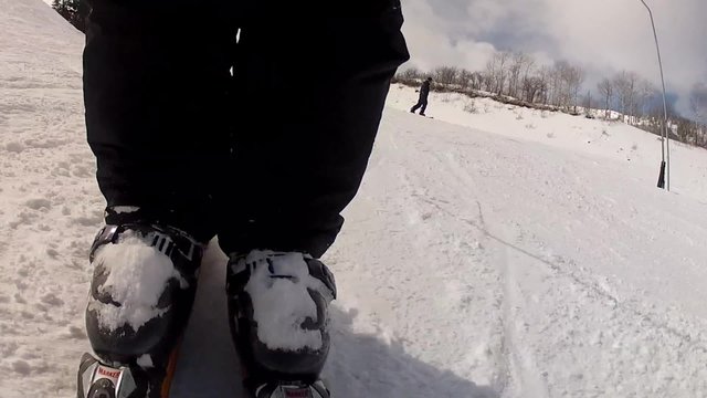 low shot of skiing fast