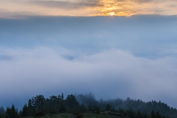 Amazing mountain landscape with fog