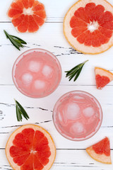 Detox fruit infused flavored water with cherry, lemon and mint. Refreshing summer homemade cocktail. Clean eating