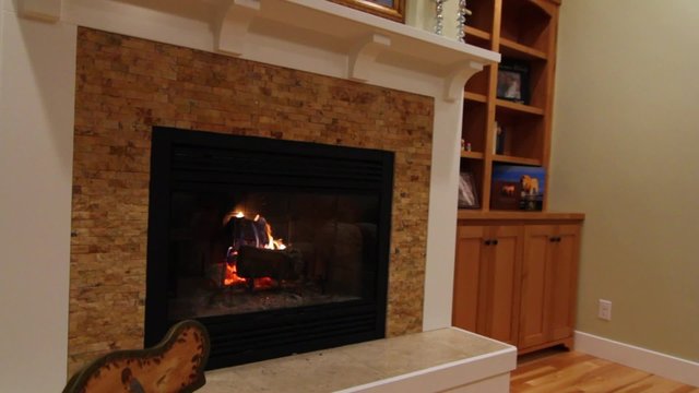 a cozy fireplace and sitting room jib shot
