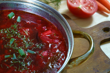 Borsch. Freshly made beet soup in saucepan.