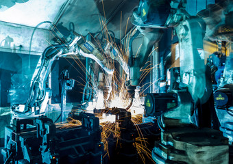 Welding Robot movement in a car factory