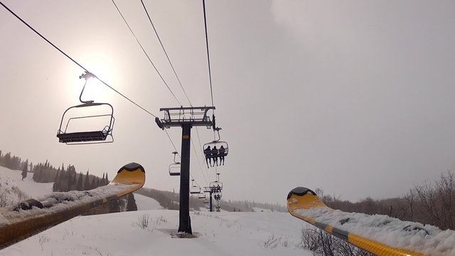skiers on lift