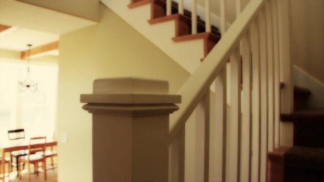 Dolly shot of stairs in a new home