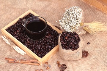 Roasted coffee beans with hot coffee