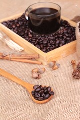 Roasted coffee beans with hot coffee