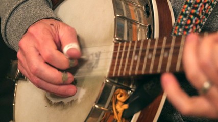 Man playing the banjo in a band