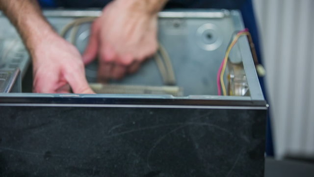 Removing motherboard from housing