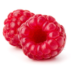 ripe raspberries isolated on white background close up © Natika