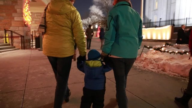 A family looks at the christmas lights on Temple Square in Salt Lake City