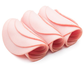 cooked boiled ham sausage or rolled bologna slices isolated on w © Natika